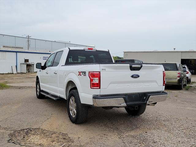 used 2018 Ford F-150 car, priced at $23,638