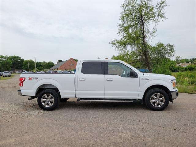 used 2018 Ford F-150 car, priced at $23,638