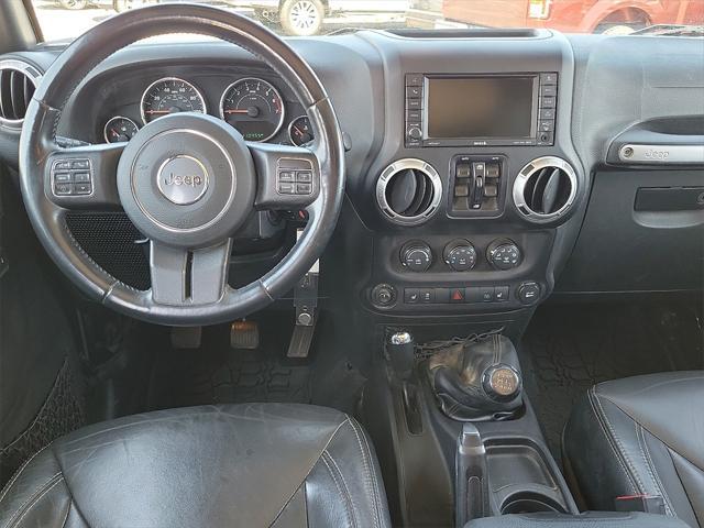 used 2015 Jeep Wrangler Unlimited car, priced at $19,541