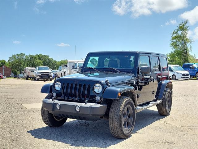 used 2015 Jeep Wrangler Unlimited car, priced at $19,541