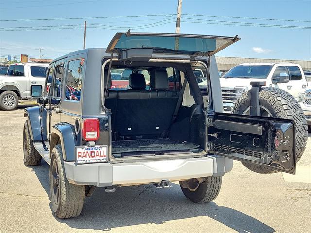 used 2015 Jeep Wrangler Unlimited car, priced at $19,541