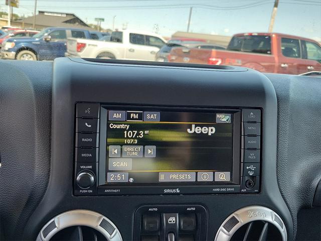used 2015 Jeep Wrangler Unlimited car, priced at $19,541