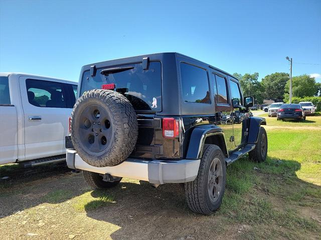 used 2015 Jeep Wrangler Unlimited car, priced at $19,541