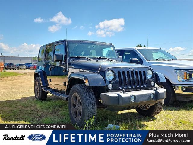 used 2015 Jeep Wrangler Unlimited car, priced at $19,541