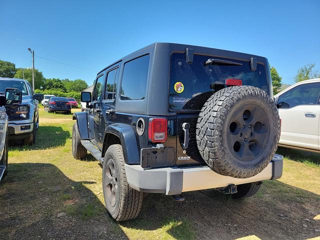 used 2015 Jeep Wrangler Unlimited car, priced at $19,541