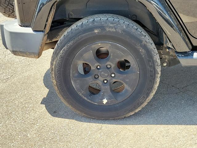 used 2015 Jeep Wrangler Unlimited car, priced at $19,541