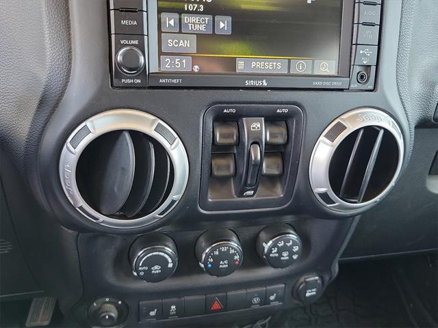 used 2015 Jeep Wrangler Unlimited car, priced at $19,541