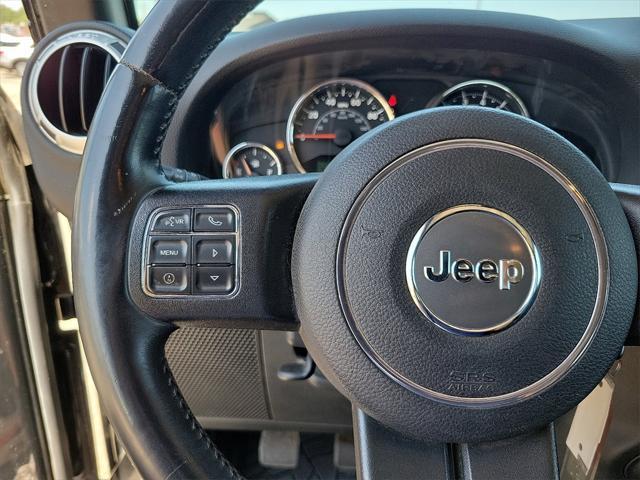 used 2015 Jeep Wrangler Unlimited car, priced at $19,541