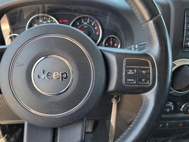 used 2015 Jeep Wrangler Unlimited car, priced at $19,541