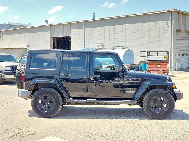 used 2015 Jeep Wrangler Unlimited car, priced at $19,541