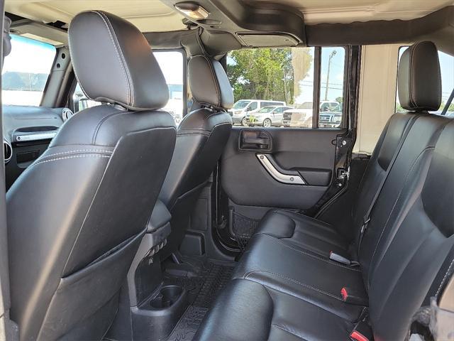 used 2015 Jeep Wrangler Unlimited car, priced at $19,541