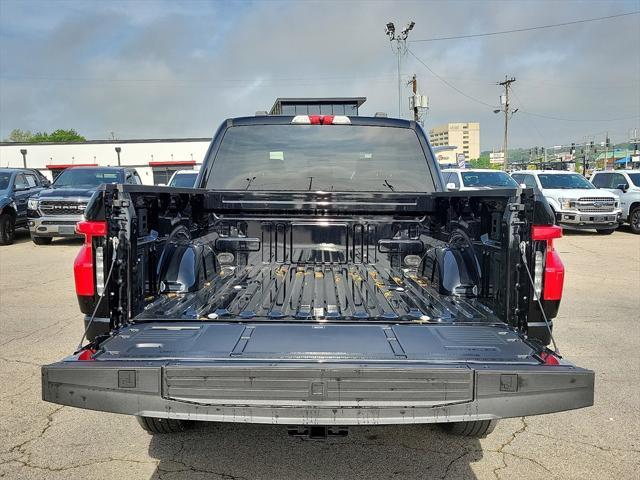new 2025 Ford F-150 Lightning car, priced at $74,015