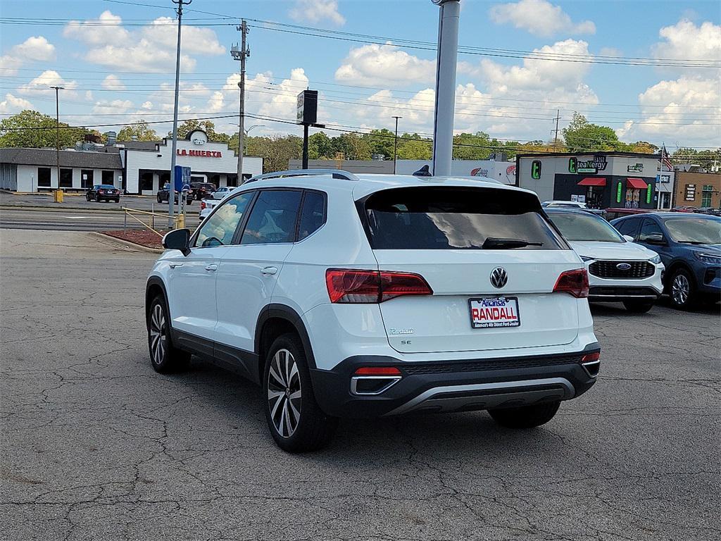 used 2023 Volkswagen Taos car, priced at $20,603