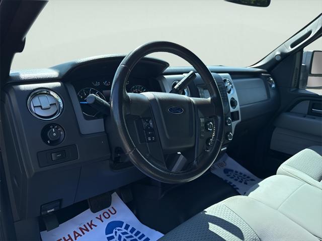 used 2014 Ford F-150 car, priced at $13,495
