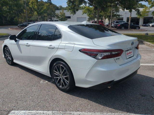 used 2023 Toyota Camry Hybrid car, priced at $27,648