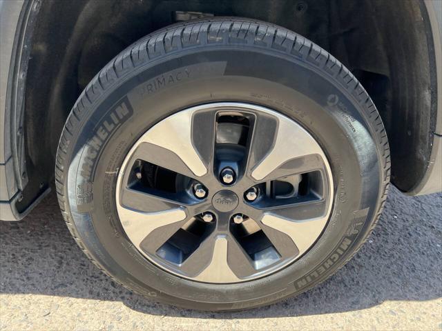 used 2023 Jeep Grand Cherokee 4xe car, priced at $27,995