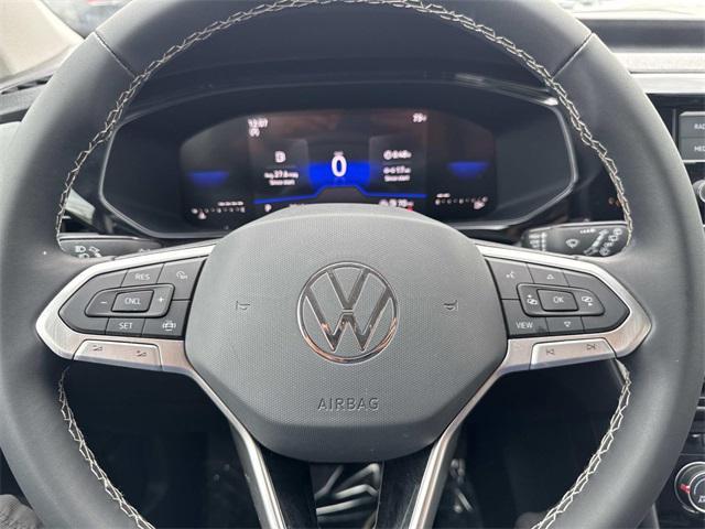 used 2023 Volkswagen Taos car, priced at $16,994