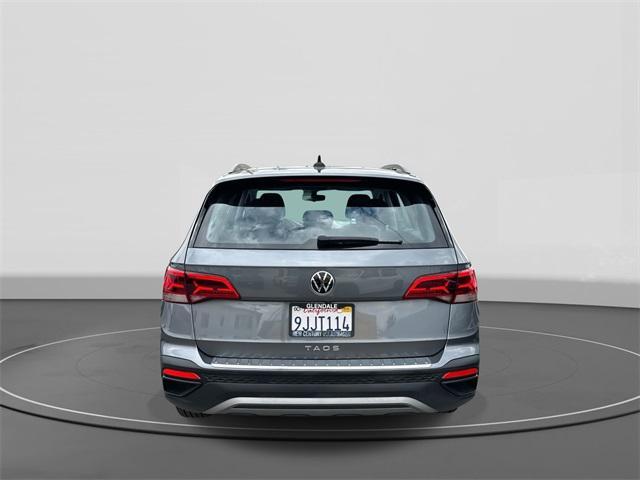 used 2023 Volkswagen Taos car, priced at $16,994