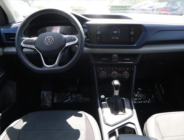 used 2024 Volkswagen Taos car, priced at $25,623