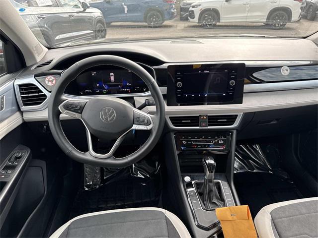 used 2025 Volkswagen Taos car, priced at $25,156