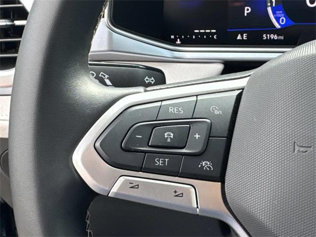 used 2025 Volkswagen Taos car, priced at $25,156
