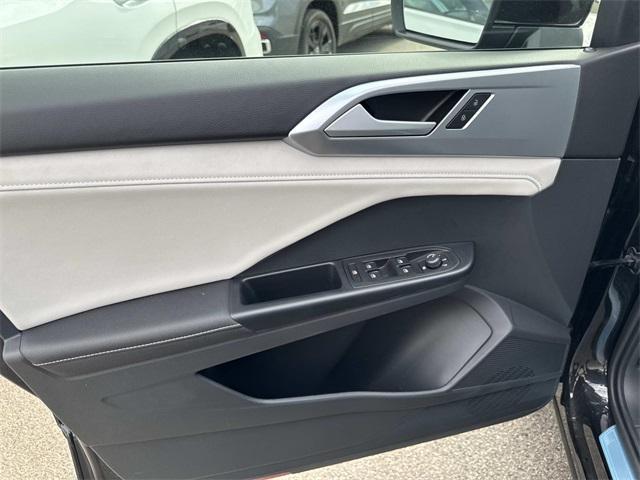 used 2025 Volkswagen Taos car, priced at $25,156