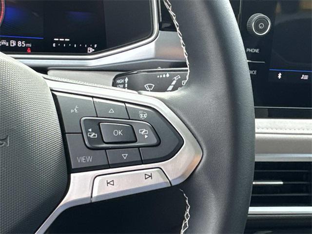 used 2025 Volkswagen Taos car, priced at $25,156