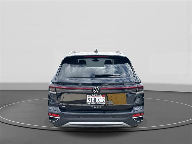 used 2025 Volkswagen Taos car, priced at $25,156