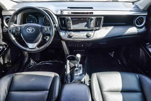 used 2018 Toyota RAV4 Hybrid car, priced at $18,495