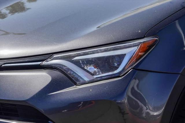 used 2018 Toyota RAV4 Hybrid car, priced at $18,495