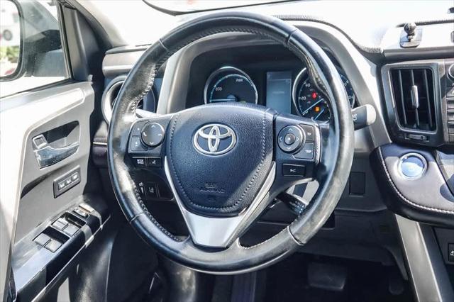 used 2018 Toyota RAV4 Hybrid car, priced at $18,495