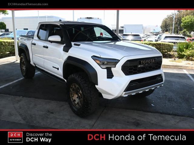 used 2024 Toyota Tacoma Hybrid car, priced at $64,547