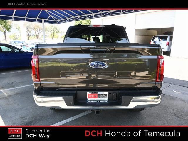 used 2024 Ford F-150 car, priced at $50,709