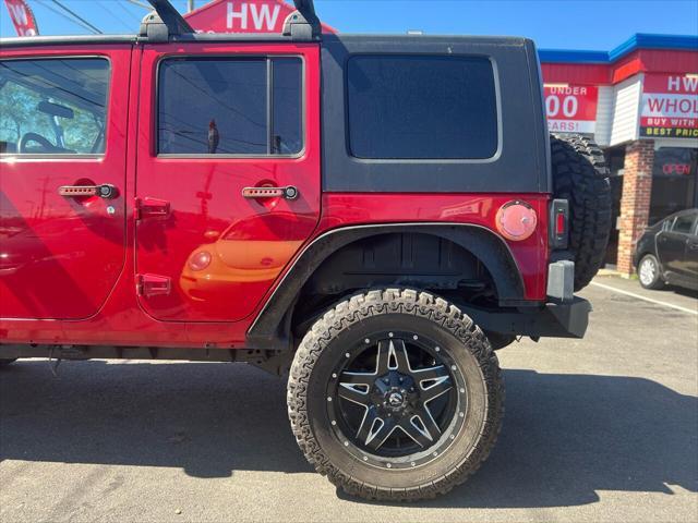 used 2011 Jeep Wrangler Unlimited car, priced at $14,995