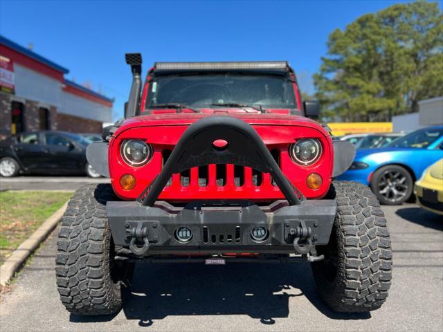 used 2011 Jeep Wrangler Unlimited car, priced at $14,995