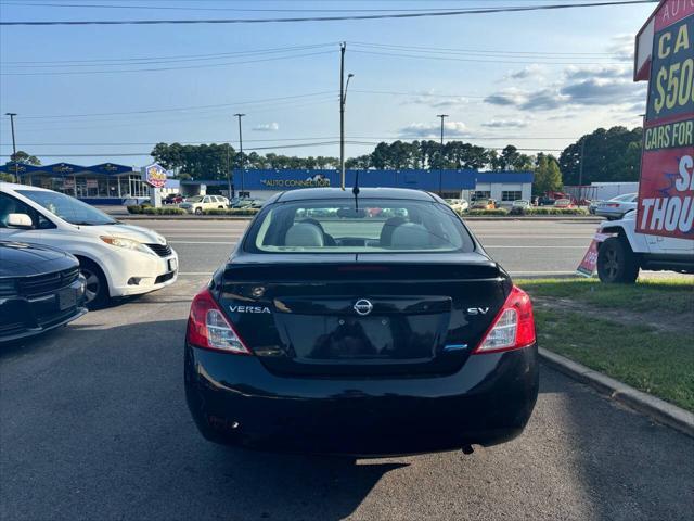 used 2013 Nissan Versa car, priced at $5,995