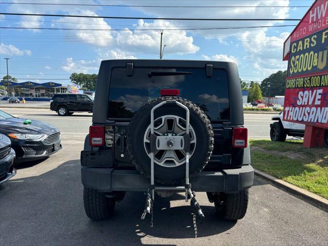 used 2014 Jeep Wrangler Unlimited car, priced at $18,995