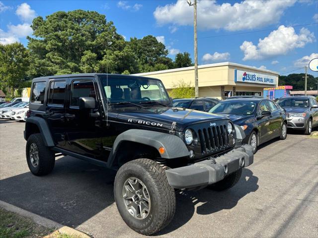 used 2014 Jeep Wrangler Unlimited car, priced at $18,995