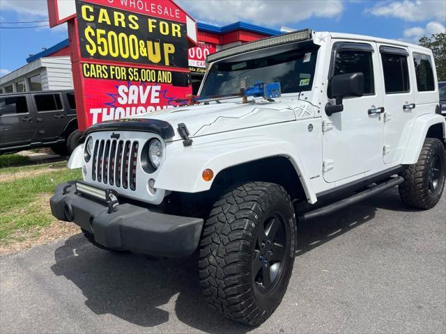 used 2015 Jeep Wrangler car, priced at $22,995