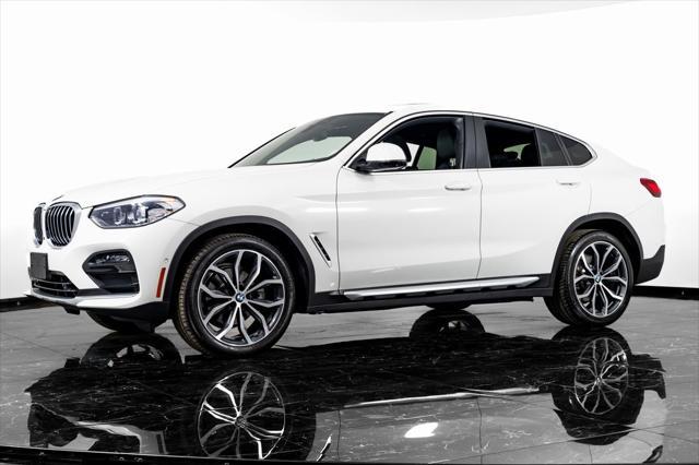 used 2021 BMW X4 car, priced at $35,999