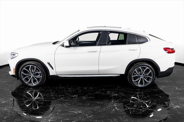 used 2021 BMW X4 car, priced at $35,999