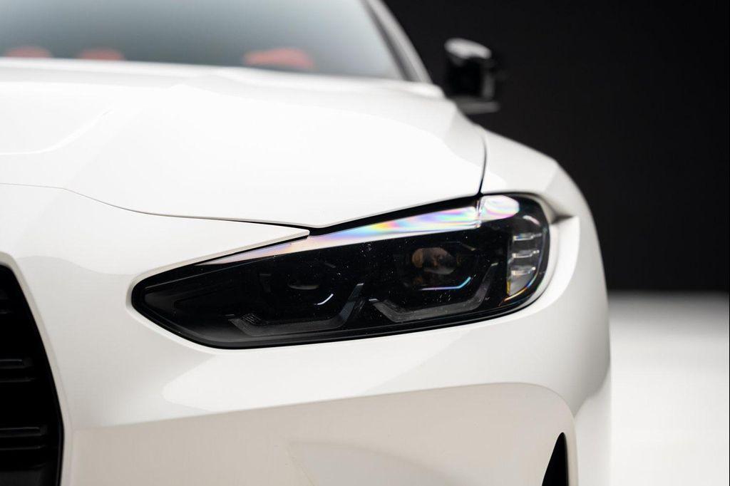 used 2023 BMW M4 car, priced at $74,999