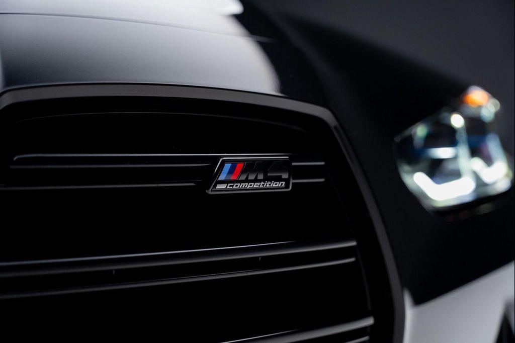 used 2024 BMW M4 car, priced at $74,799