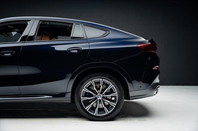 used 2025 BMW X6 car, priced at $85,999