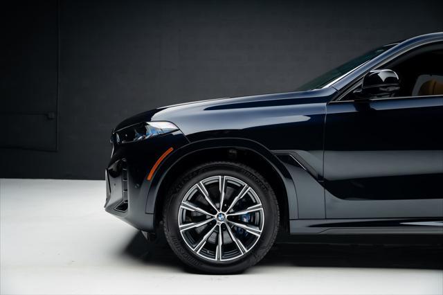 used 2025 BMW X6 car, priced at $85,999