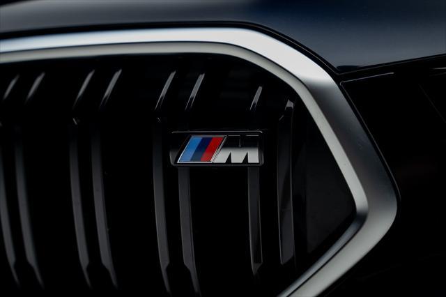 used 2025 BMW X6 car, priced at $85,999
