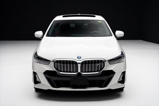 used 2024 BMW i5 car, priced at $55,999