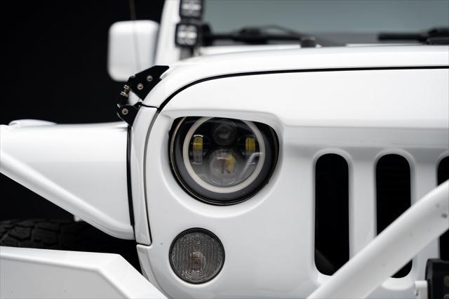 used 2016 Jeep Wrangler Unlimited car, priced at $23,999