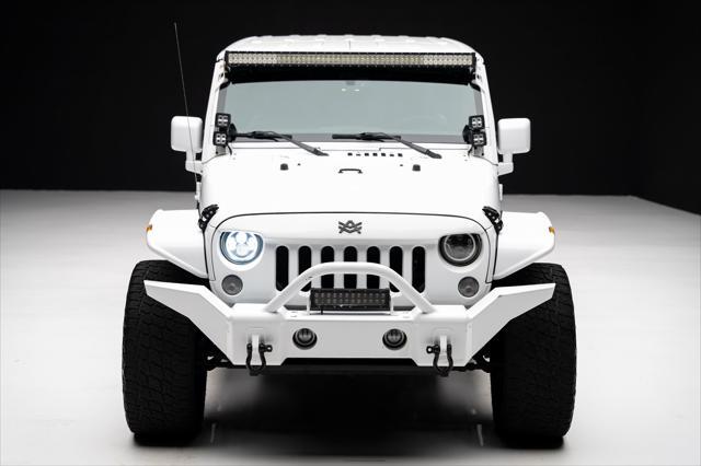 used 2016 Jeep Wrangler Unlimited car, priced at $23,999