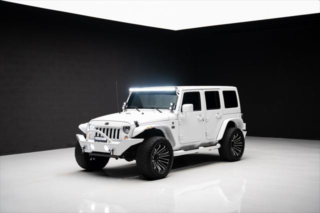used 2016 Jeep Wrangler Unlimited car, priced at $23,999